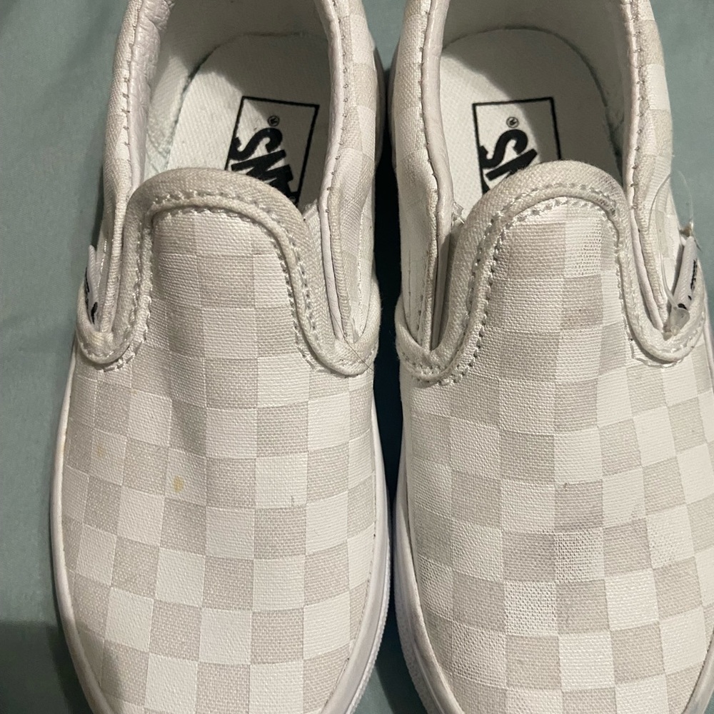 Vans checkered slip ons